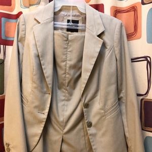 Cream colored Limited suit.  Jacket size 0.
